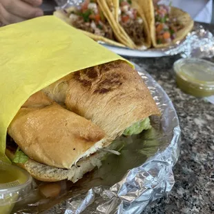 a person eating a sandwich