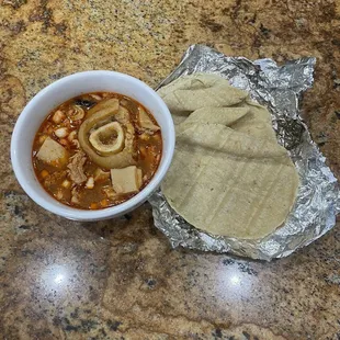 Menudo and tortillas (one missing due to my wife eating one)