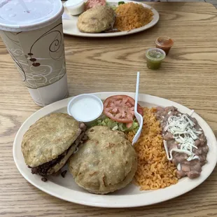 a plate of food and a drink