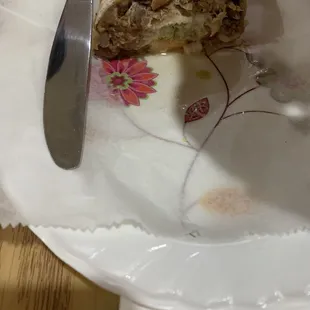 Half of a pork burrito ( other half eaten)