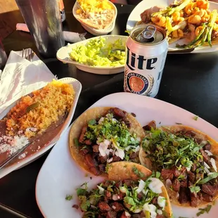 A flight of tacos, the chefs special.  Mine was steak, above was my friends pork tacos.  Mmmm.   Best quality ever.