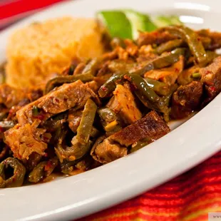 Fritanga carnitas and nopales simmered in our own special sauces!