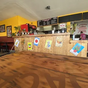 a wooden table in a restaurant