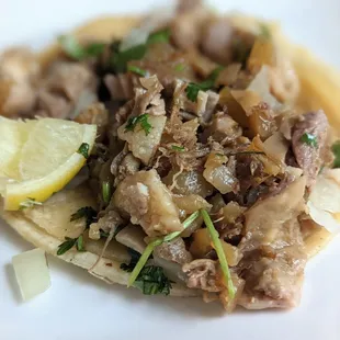 Amazing Mixtas Tacos: Pork shoulder, stomach, and skin. They are BIG!