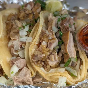 Amazing Mixtas Tacos: Pork shoulder, stomach, and skin. They are BIG!