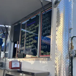 a food truck with menus