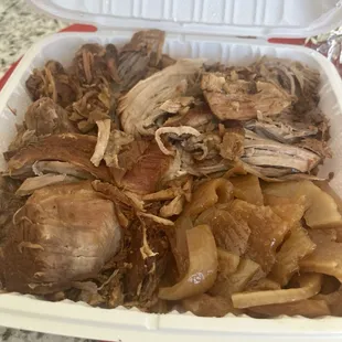 1.5 pounds of carnitas, 1/2 pound of cueritos.