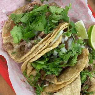 Carnitas, crispy tripa, asada taco