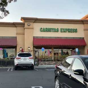 a car parked in front of a store