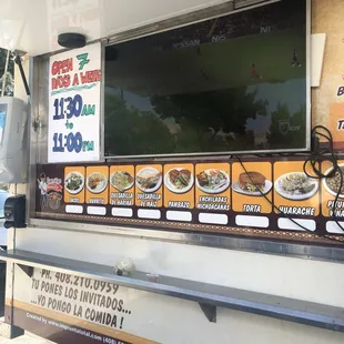 Tv + menu on the side of the truck