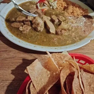This is the chili Verde plate. Pork meat soaked in amazing green sauce served with fresh beans and rice. Fresh hand made flour tortillas.