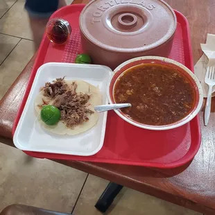 Cabesa is in the bowl and a carnitas taco