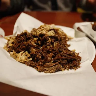 a plate of pulled pork