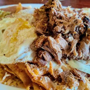 Chilaquiles with added carnitas...$15.99, $16.99, or $17.99 depending on the day :(