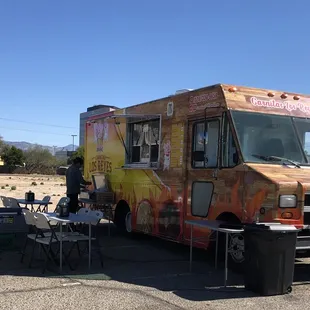 a food truck parked in a parking lot