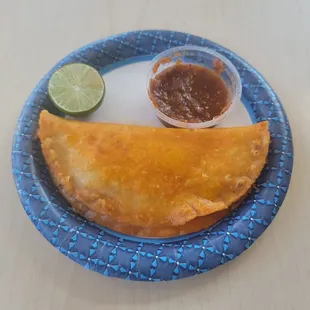 quesabirra taco with spicy tomotillo salsa. a must have.