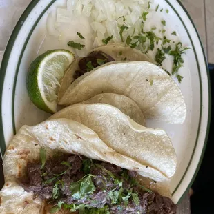 Barbacoa tacos $4