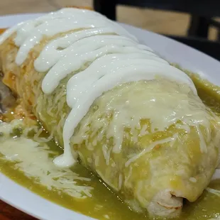 Pork Pastor Wet burrito with red and green sauce