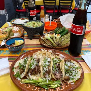 a table full of mexican food