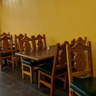a row of tables and chairs