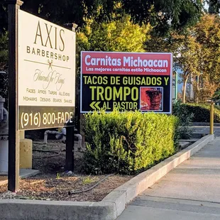 a sign on the side of the road