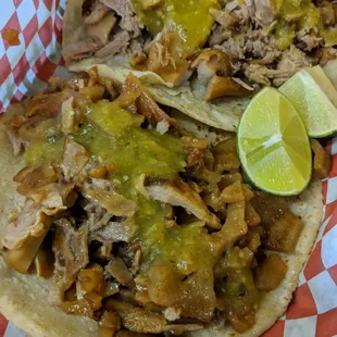 Real carnitas de Michoacán tacos. Handmade tortillas. Mix carnitas have cuerito, maciza, y buche.