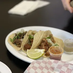 Asada, al pastor, and carnitas tacos