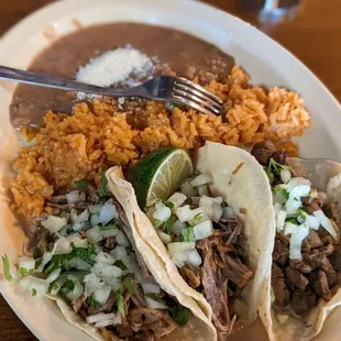 Tacos plate with carnitas and asada