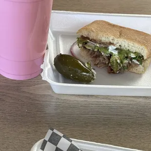 Agua de fresa .Strawberry water , with  half a torta ..torta cortada a mita