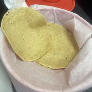 Menudo with pigs feet, hand made tortillas, and carnitas tacos.