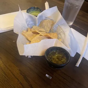 Complimentary chips and two salsas