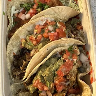 Taco Tuesday special: 3 tacos (from the bottom- grilled chicken, carnitas, fried fish)