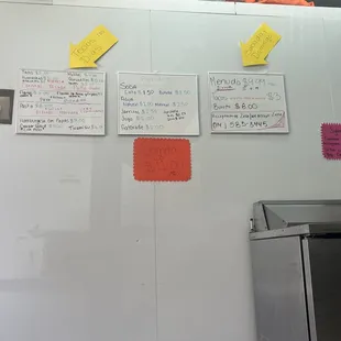 a whiteboard with notes on it