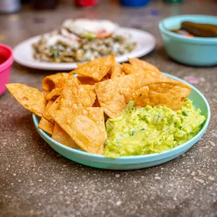 Homemade guacamole and homemade crispy chips