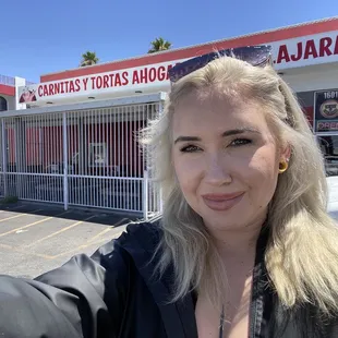 a woman taking a selfie