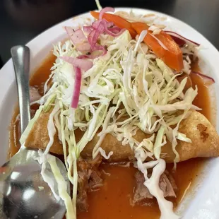 Very authentic and delicious Tacos dorados con carne de buche