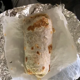 a burrito wrapped in foil