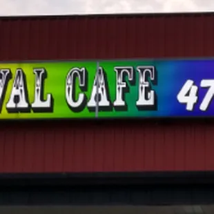 the sign for carnival cafe
