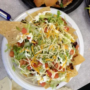 Nachos! big enough for the hungriest person! loaded with your choice of meat, and all the toppings!