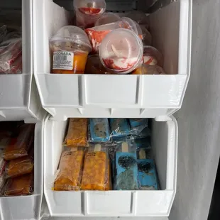 the inside of a refrigerator full of food
