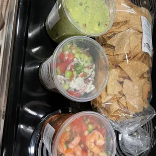 Hand packed guac , shrimp ceviche and shrimp cocktail plus Carnival in house made corn tortilla chips