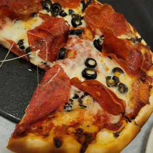 Pizza has thin, dry, cracker like crust. Not good.