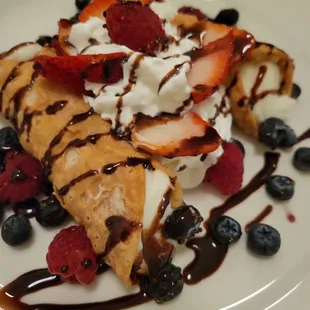 Cannoli - just OK. Didn't need whipped cream &amp; berries.