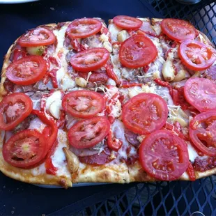 Regular size Viking pizza, added tomato