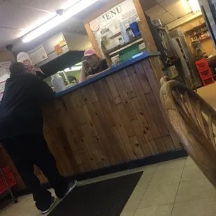 a man standing at the counter