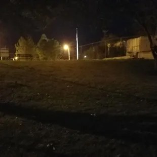 The slope in the large dog area that hides you from the street.