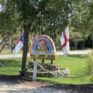 Fun logo on the roadside sign.