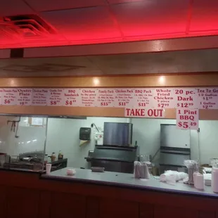 a restaurant counter with a red light