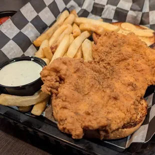 Fried chicken sandwich, large pounded out breast, but the batter could use some help.