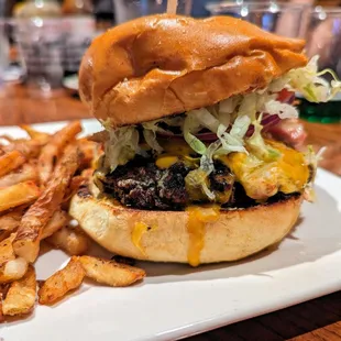 Carolina On My Mind Burger. $14.50. House-ground beef, pimento cheese, bacon, iceberg, tomato, red onions, house pickles, Carolina Gold BBQ.